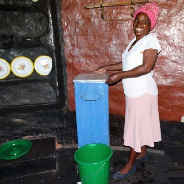 Photo of Mrs Masikati and her water filter