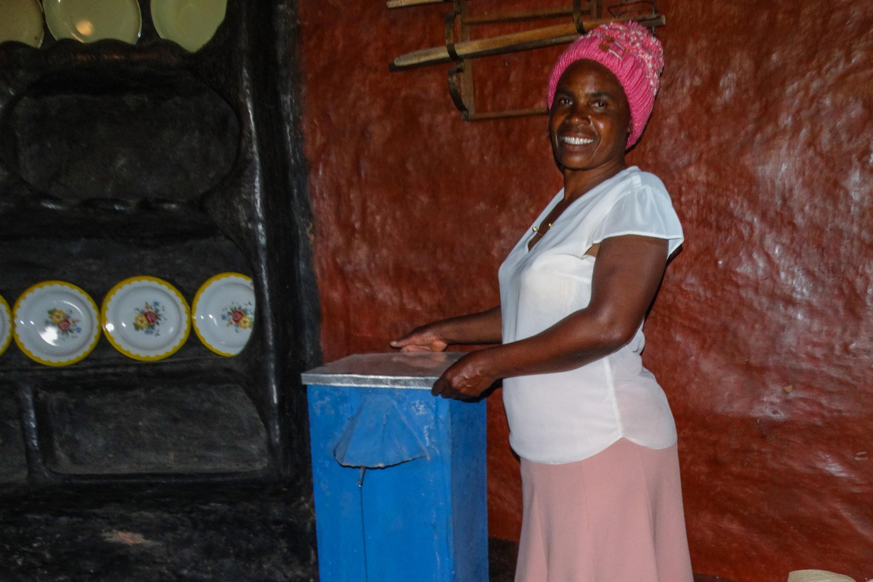 a woman by a water filter